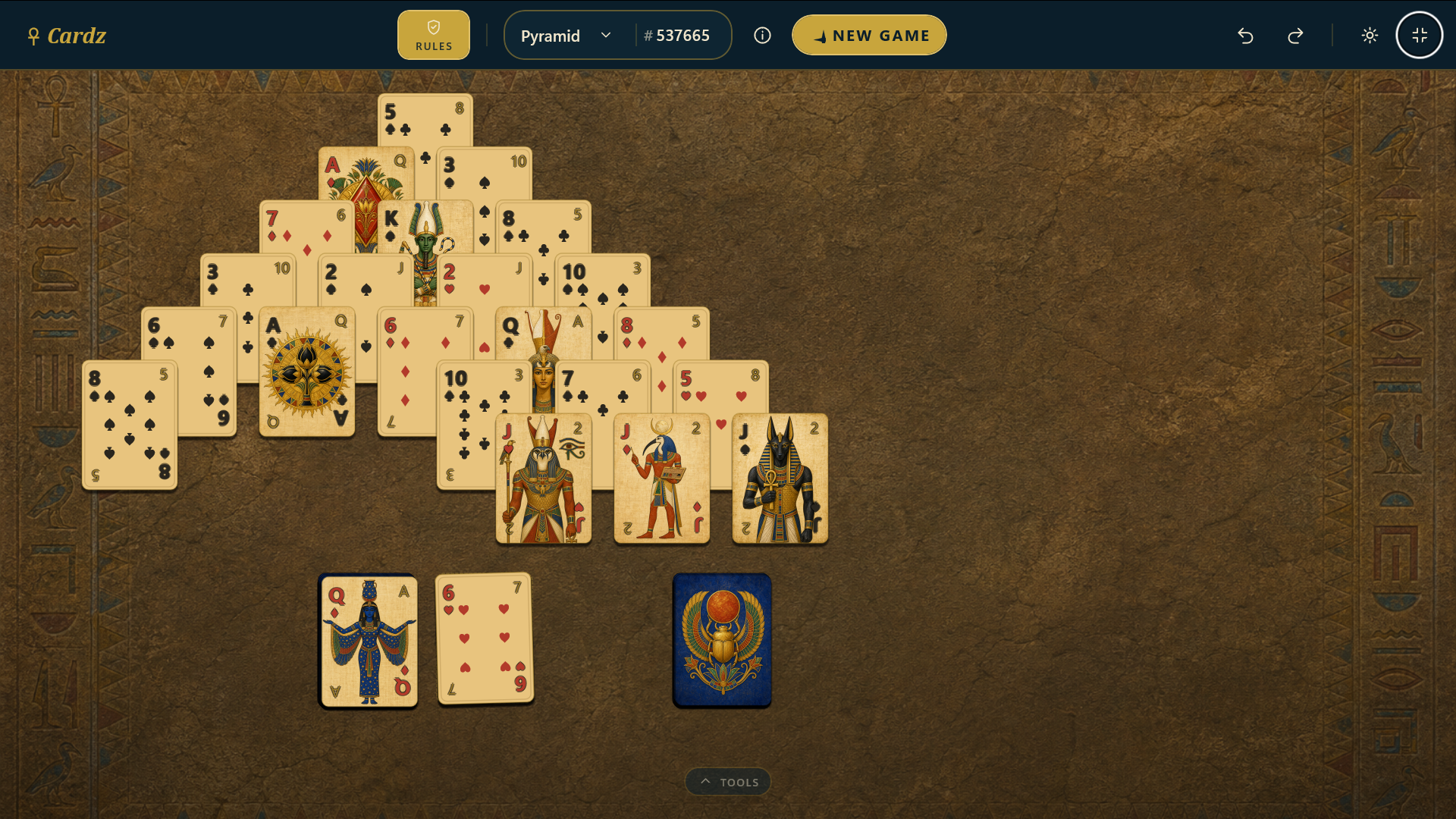 Pyramid solitaire with the Scarab card deck